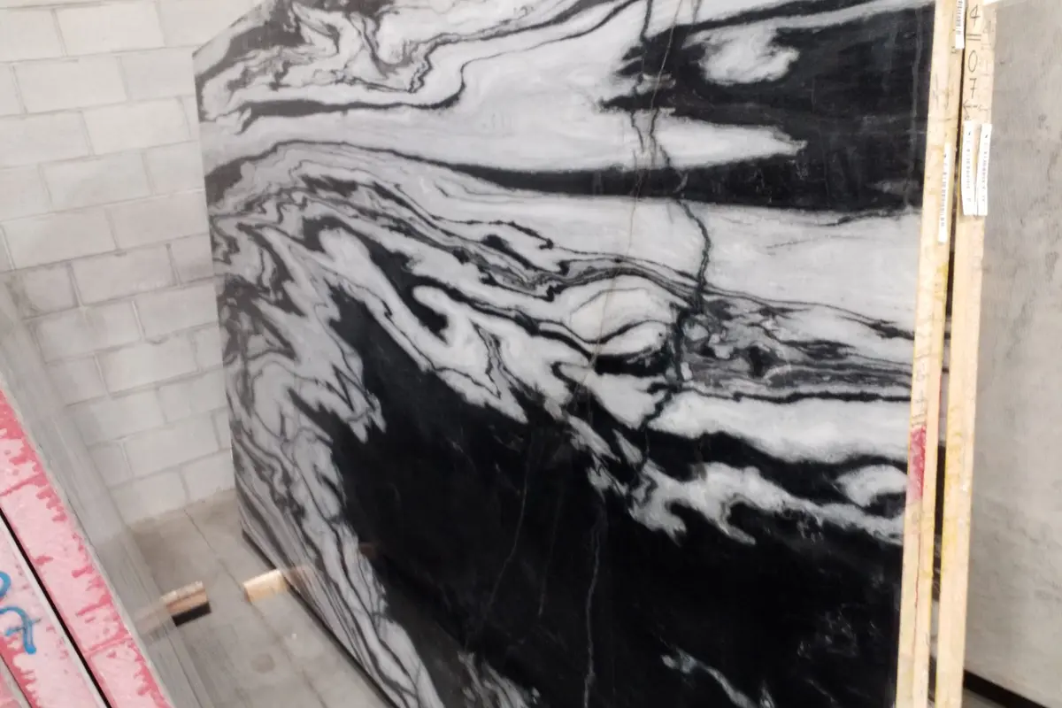 Nero Picaso polished marble slab with dramatic black and white movement