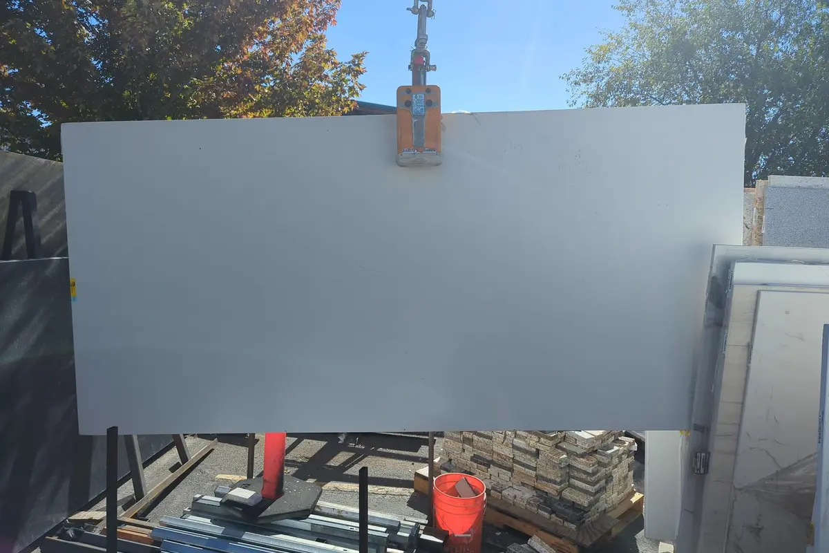 Palm Shade honed outdoor quartz slab displayed in the RBG yard