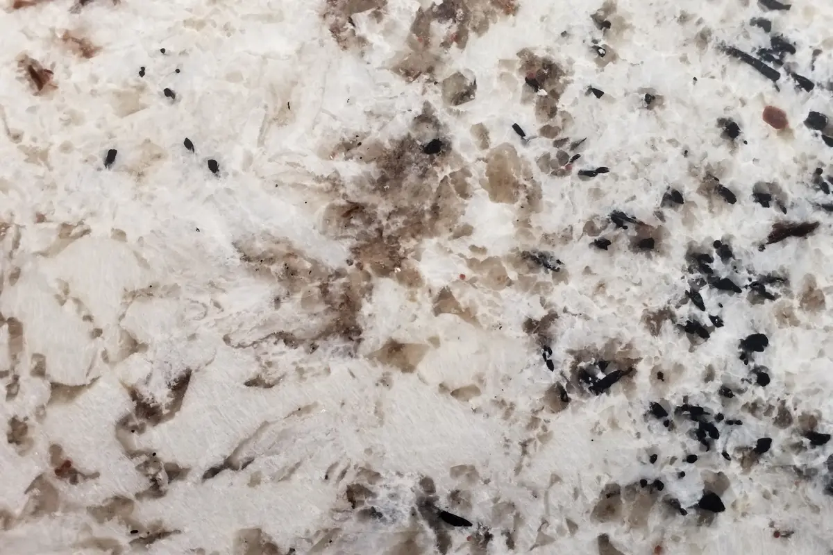 White Bariloche polished granite with white black and warm mineral details